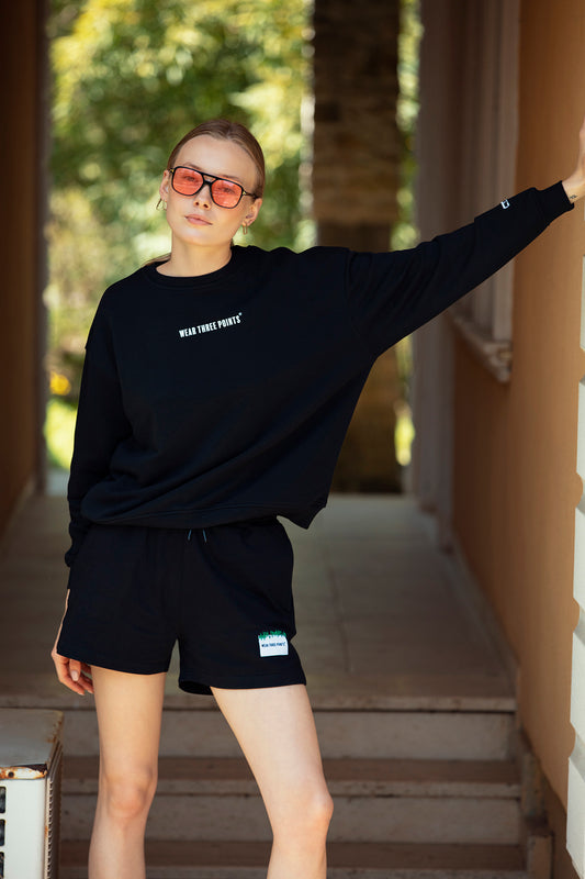 "WEEKEND" Oversized Sweatshirt in schwarz